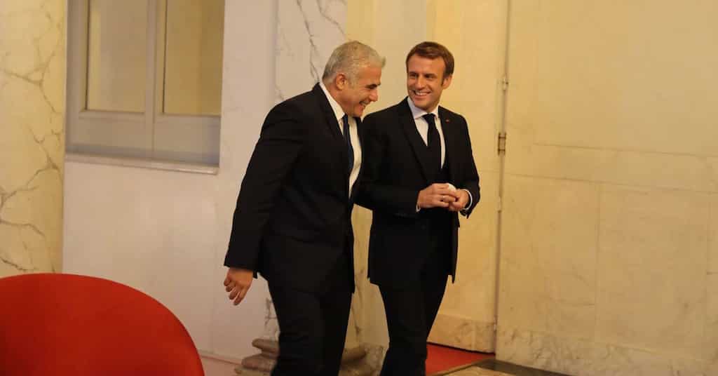 Yair Lapid visits France on his first foreign trip as PM