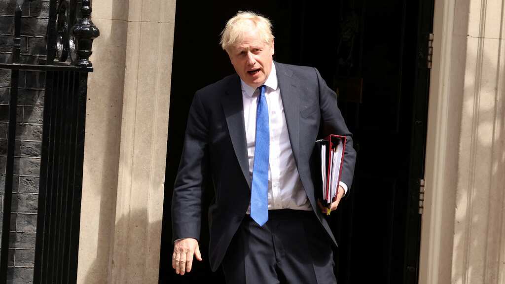 'Bye Bye Boris' buzzes in British parliament but Johnson vows to stay in power