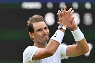 Rafael Nadal pulls out of Wimbledon semi-final with abdominal injury