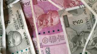 Rupee tumbles to a new record low. Closes at 81.62 per dollar