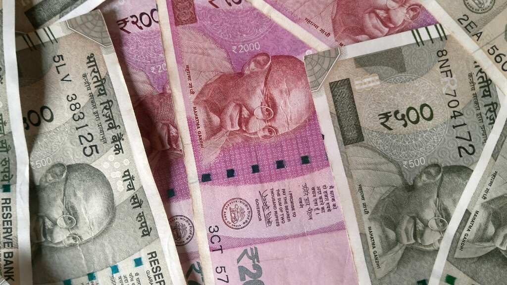 Indian rupee hits low of 80 per dollar for the first time ever