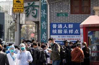 Chinese officials say sorry for breaking into houses of quarantined Covid patients