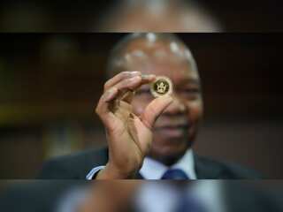 Zimbabwe launches gold coin as currency to battle extreme inflation