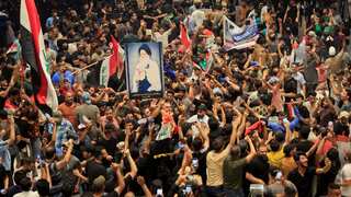 Iraq: Supporters of cleric Moqtada Sadr storm parliament in fortified Green Zone