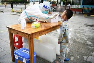 Wuhan puts one district under lockdown after detecting four COVID-19 cases