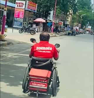 Specially abled delivery executive rides wheelchair to deliver food; wins internet for the day