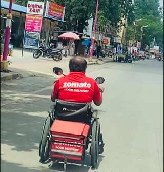 Specially abled delivery executive rides wheelchair to deliver food; wins internet for the day