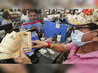 Americans race to buy mega millions lottery tickets