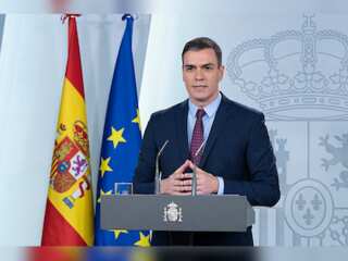 Spanish PM Pedro Sanchez urges employees to stop wearing ties to save energy
