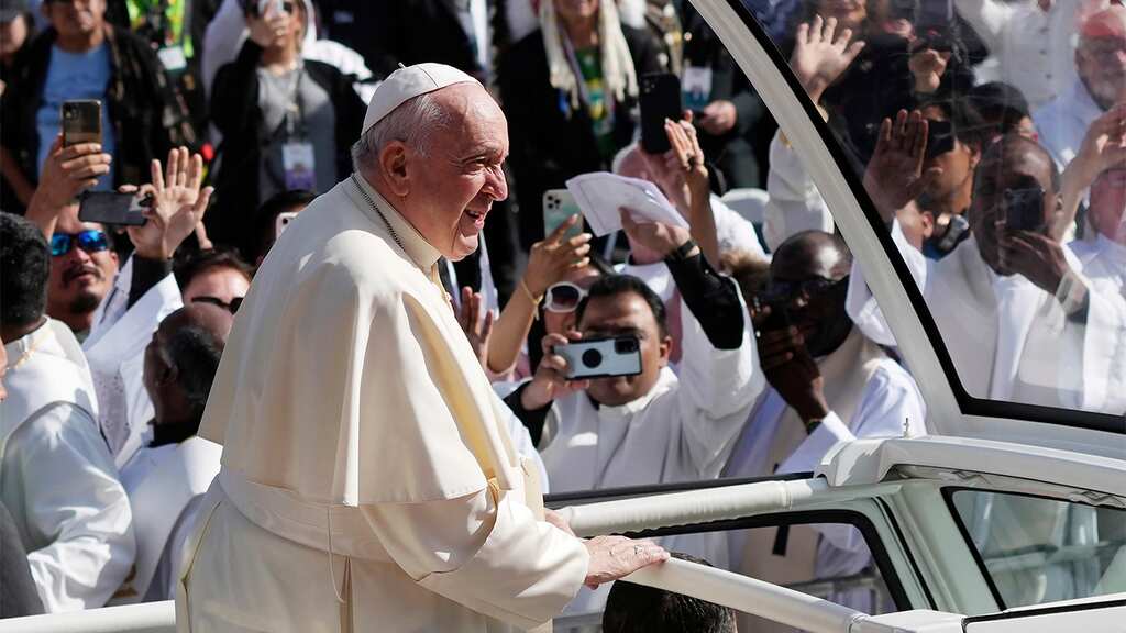 Pope Francis says he needs to slow down travel or consider retirement
