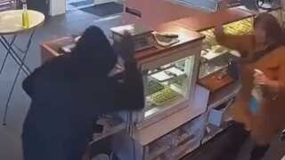 Viral video: Woman baker fights off armed robber with a cleaning cloth