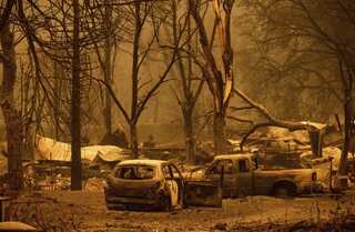 Two found dead in a torched car as California wildfire continues to wreak havoc