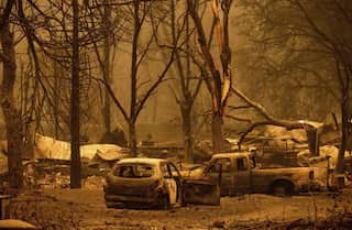 Two found dead in a torched car as California wildfire continues to wreak havoc