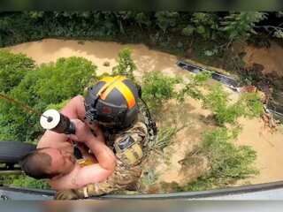 In pics | Hanging, drowning, holding on: Ravaging Kentucky floods lead to dramatic rescues