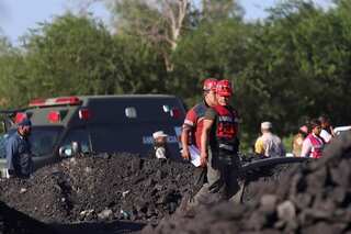 Cave-in at a coal mine traps 9 miners in northern Mexico