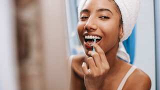 One of the weirdest revelations of today: Not using a brush can help you get whiter teeth