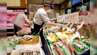 Japan’s households raise spending for first time in 4 months