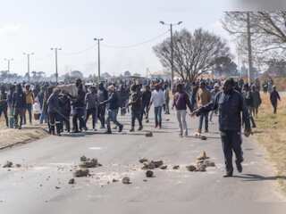 Gang rape in South Africa sparks outrage; thousands of protesters raid illegal miners