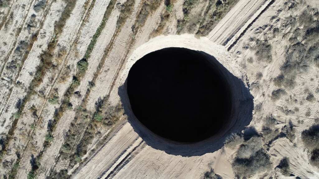 Sinkhole in Chile doubles in size, large enough to swallow France's Arc de Triomphe