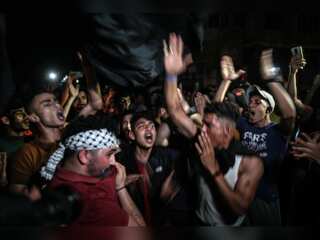 Celebrations in Gaza as Israel and Palestinian militants declare truce