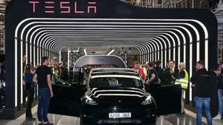 Are children at risk from Elon Musk's self-driving technology? Group claims software will 'mow' kids down