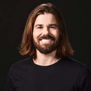 A CEO who pays $80,000 minimum wage and lets employees work from anywhere