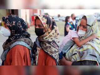 Afghan refugees in Australia build a new life, social programmes help newly arrived
