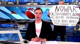 Russian court orders house arrest for former state TV journalist who raised 'No War' poster