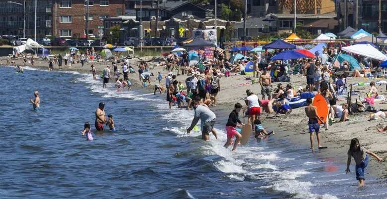 Californians beat the heat in a Seattle-style rain booth