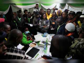Kenyans anxiously await poll results | Tight race between Odinga and Ruto