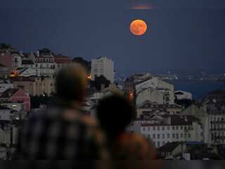 The last supermoon of the year illuminates the sky