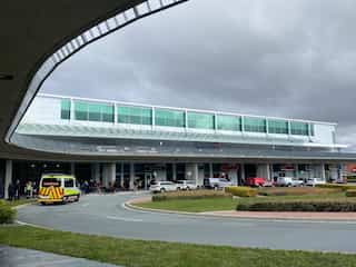 Canberra airport evacuated after armed man opens fire; one detained