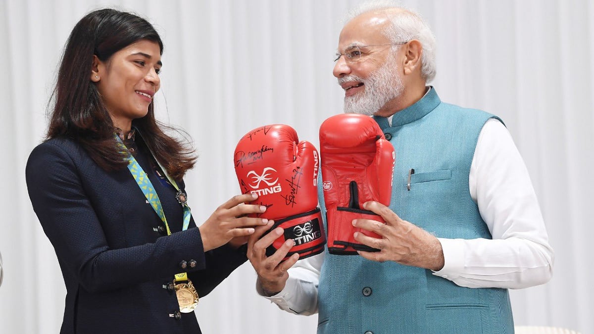 Commonwealth Games 2022 gold medallist Nikhat Zareen gifts boxing gloves to PM Narendra Modi Commonwealth Games 2022 gold medallist Nikhat Zareen gifts boxing gloves to PM Narendra Modi