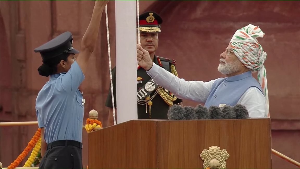Narendra Modi hoists the national flag