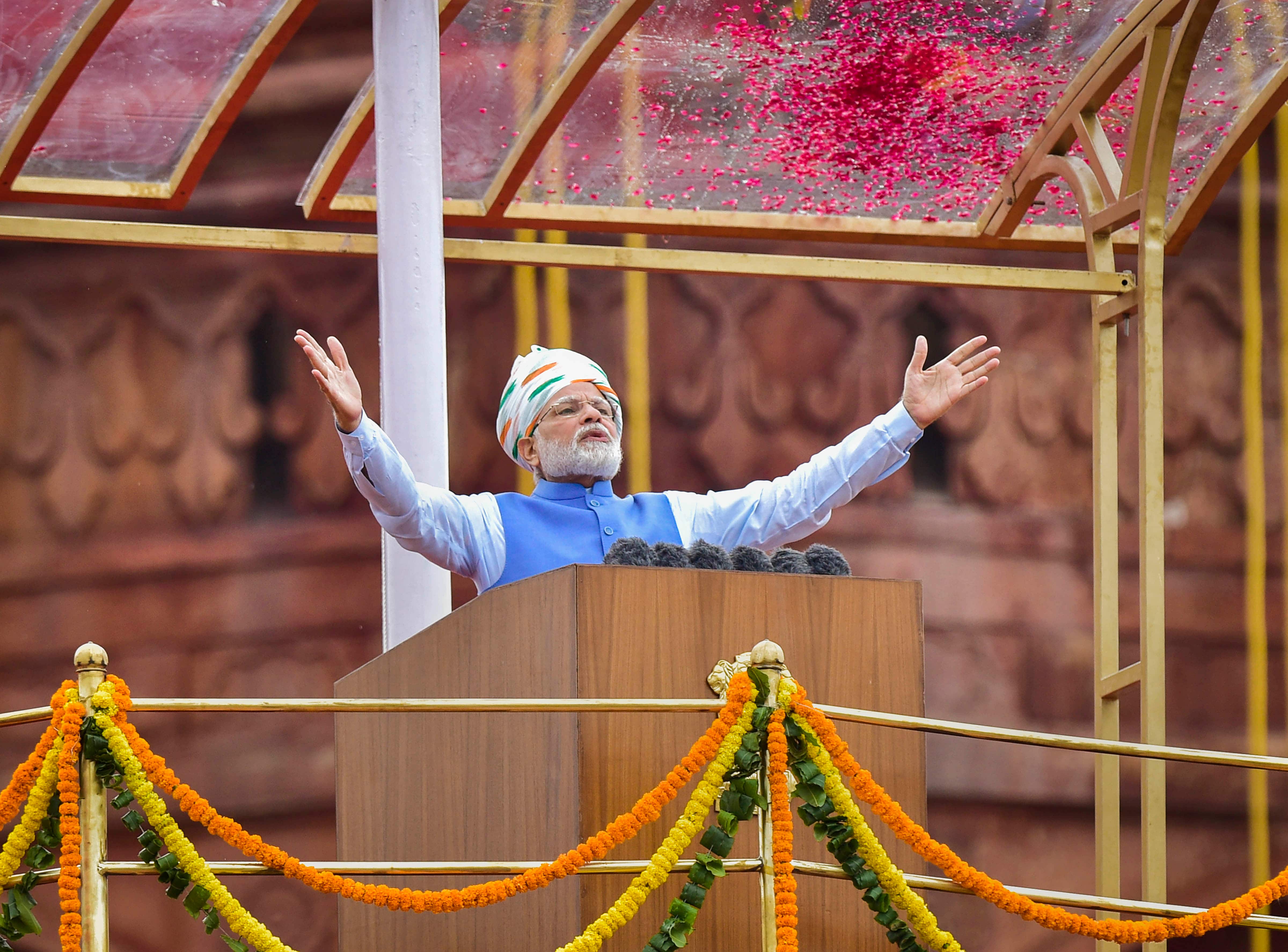 PM Modi gestures as he addresses the nation