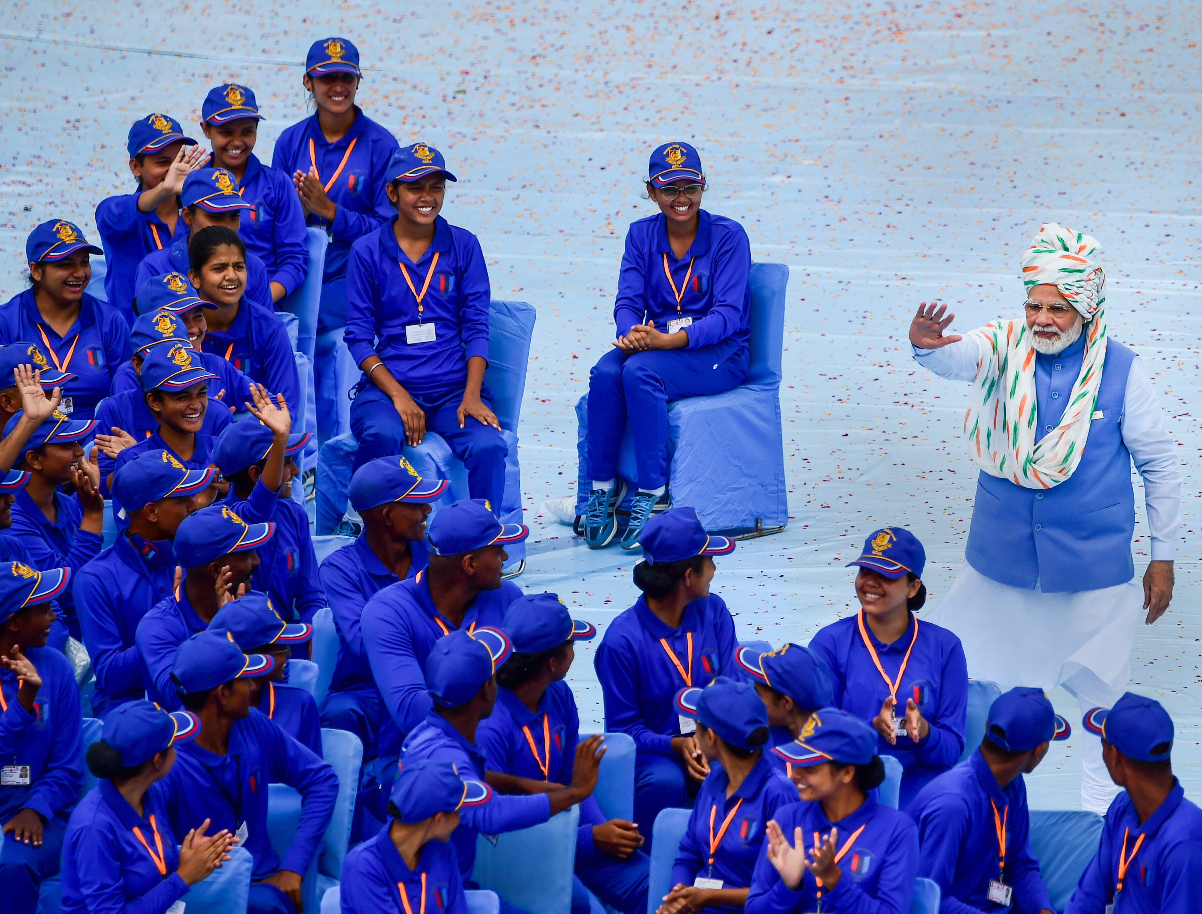 PM Modi waves at schoolchildren