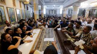 Triplets and twins among 15 children killed in electrical fire that swept through Egyptian church
