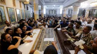 Triplets and twins among 15 children killed in electrical fire that swept through Egyptian church