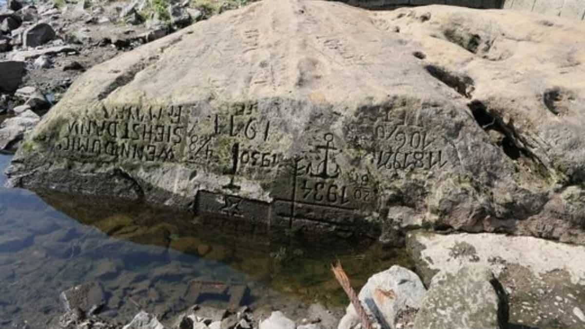 'If you see me, weep': Europe's histsoric drought uncovers centuries-old macabre warnings