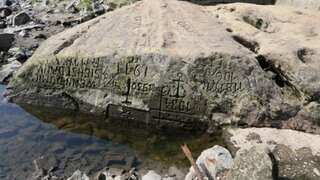 'If you see me, weep': Europe's histsoric drought uncovers centuries-old macabre warnings