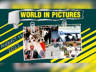 World in Pictures: Street flooded in Pak's Peshawar; Rishi Sunak visits Thales Defence System plant
