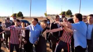 'Coward' Jair Bolsonaro gets into a spat, tries to snatch phone off heckler. Watch video here!