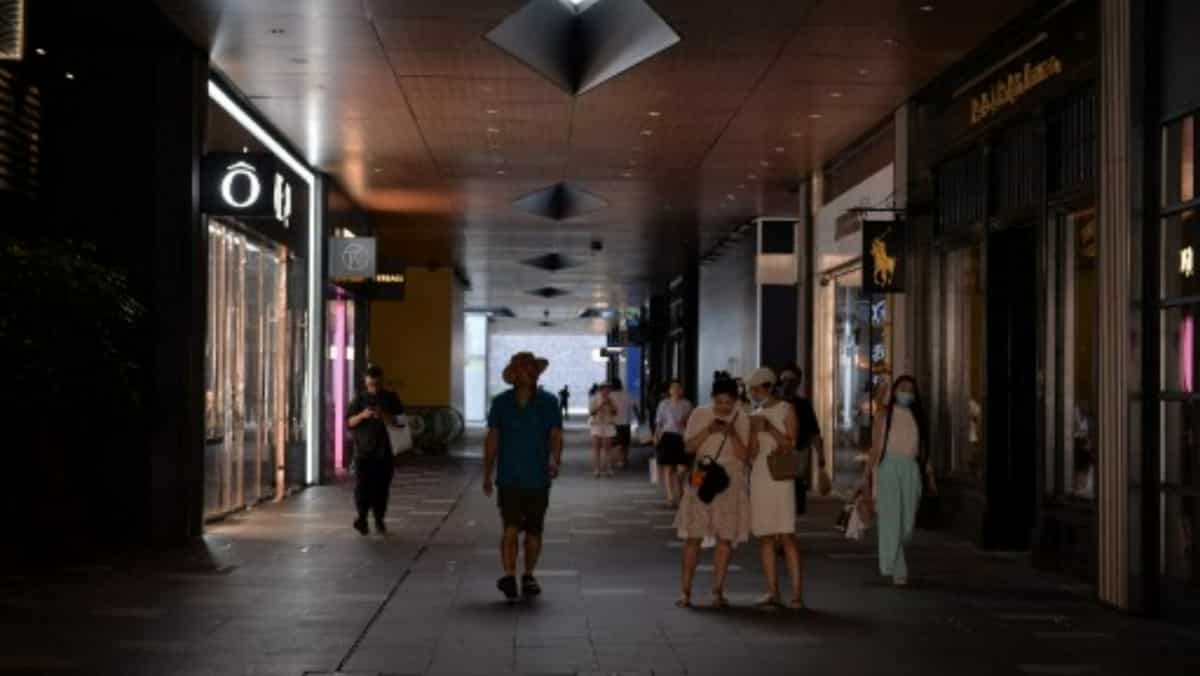 Chinese city dims lights to save power amid heatwave Chinese city dims lights to save power amid heatwave