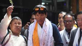 48-year-old Nepali sherpa sets climbing record by scaling all the world's 14 peaks