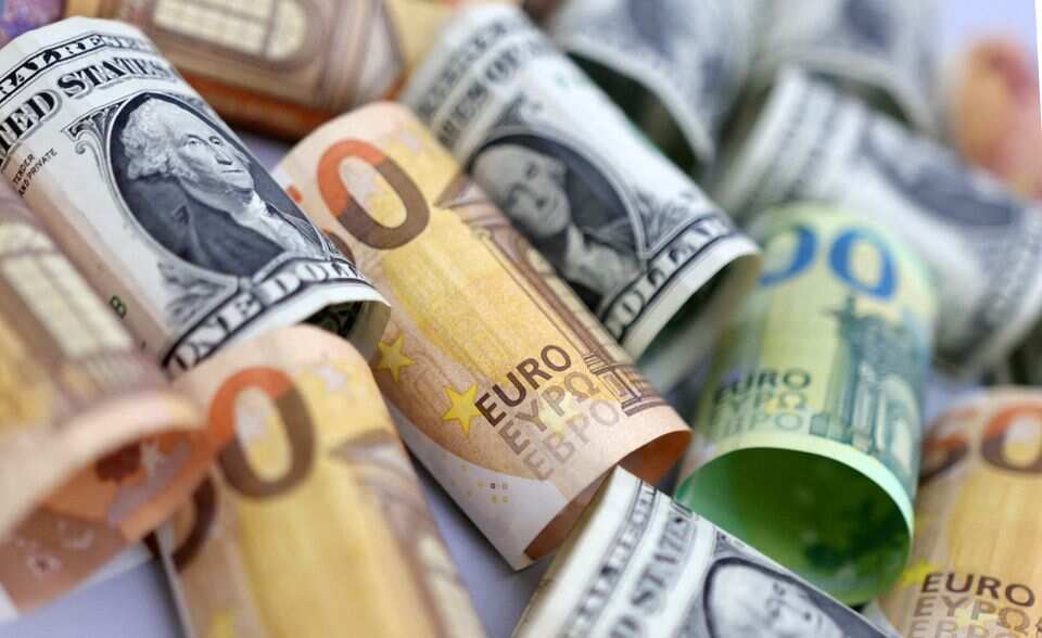 Euro slips below 99 cents for the first time in over two decades