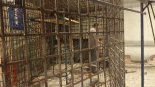 Ukraine war: UN condemns cages put up in Mariupol concert hall for prisoners of war
