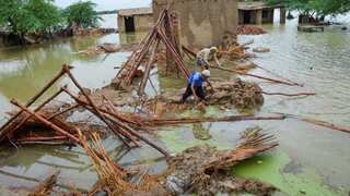 Pakistan declares national emergency after floods kill more than 900 people, seeks aid