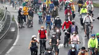 Thousands of cyclists take over German motorway in protest against poor public transport