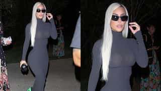 Kim Kardashian attends LA charity event in figure-hugging black dress and neon heels