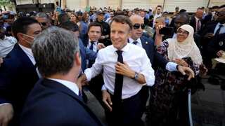 Emmanuel Macron abandons walkout in Algeria, crowd accuses him of humiliating France